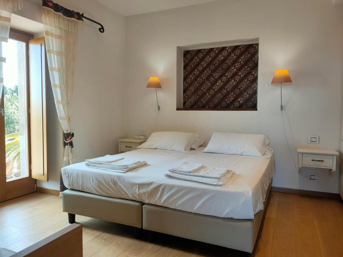 Alimunera Hotel Naso Bagian luar foto